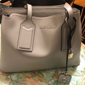 Marc Jacobs bag new has tiny stain